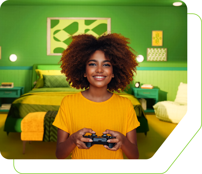 A person gaming while holding a controller.